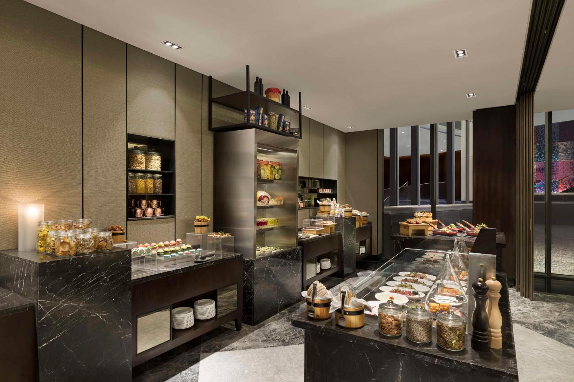 Hilton Bengaluru Embassy Manyata Business Park Hotel Екстериор снимка